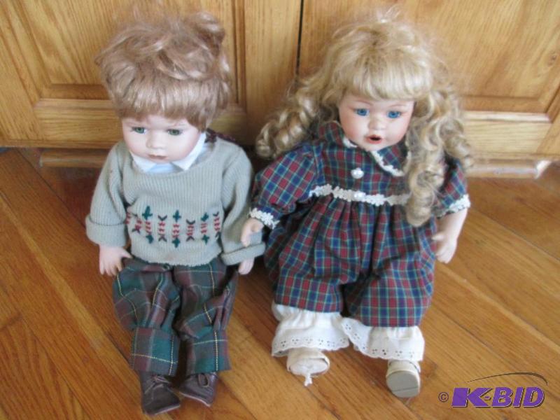 2 porcelain dolls...