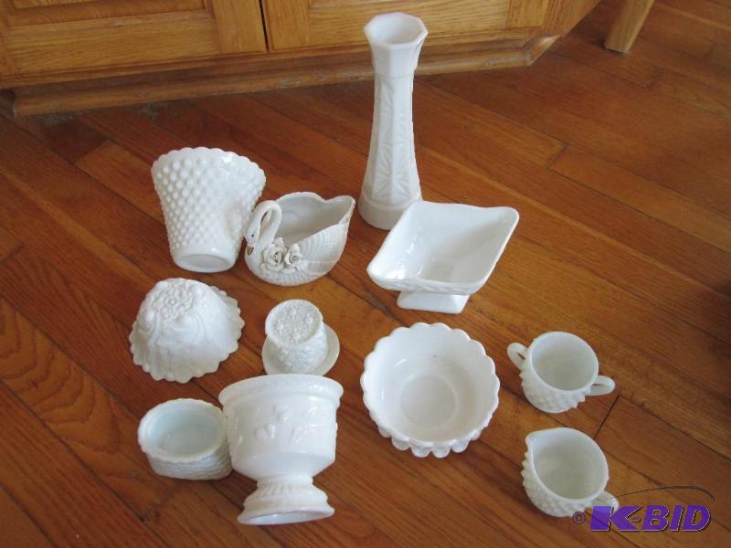 Lot of fancy white glassware...