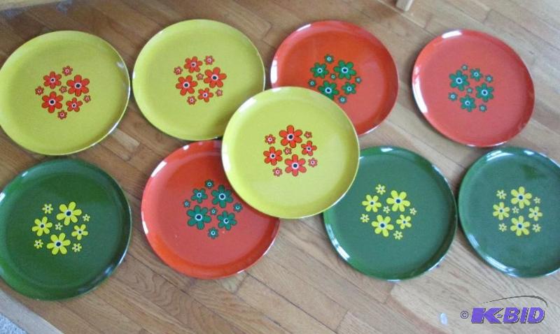 Flower plates, 13 inches across, look new...