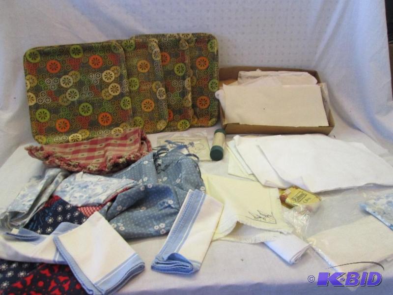 lot of assorted cross stitch, aprons, and bam...