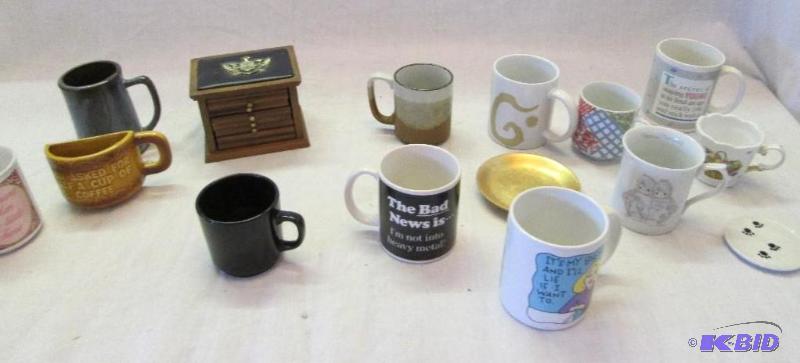 mixed lot of mugs and a sister blood mug hold...