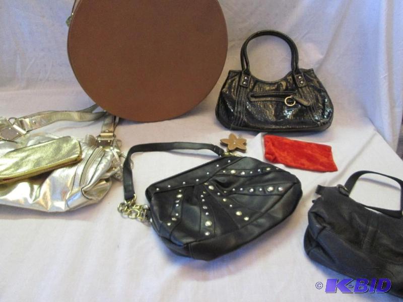 lot of assorted purses and a hat box...