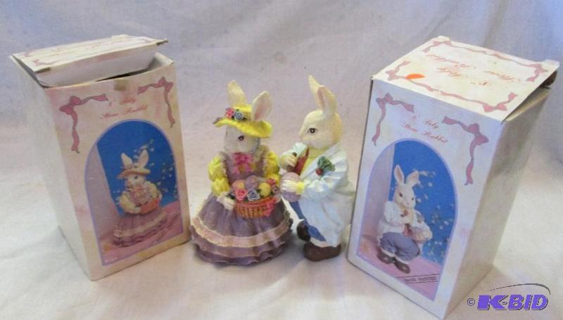 2 8 poly stone rabbits...