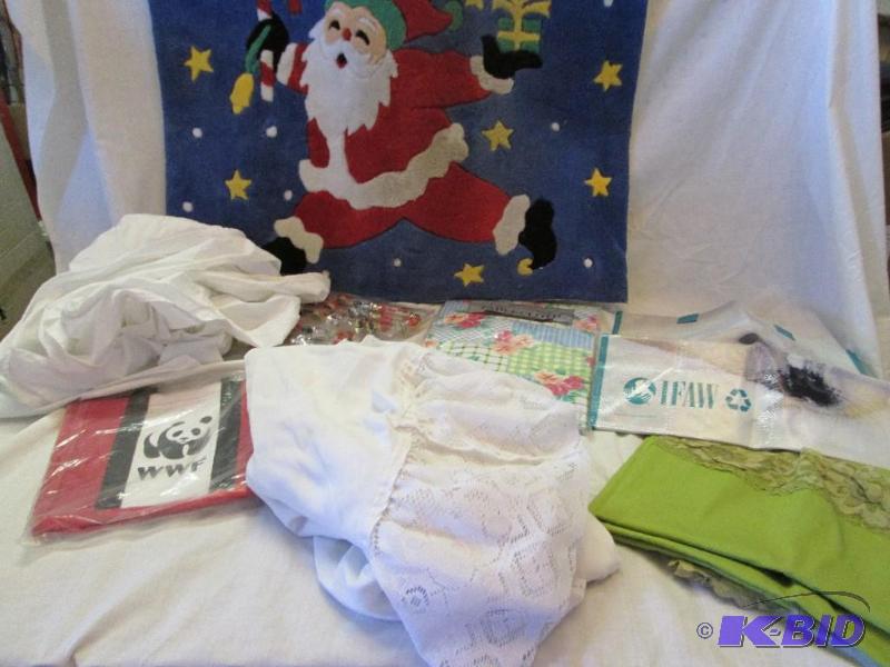 santa rug 20in x 32in and assorted material, ...