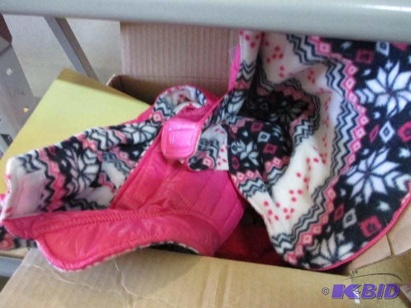 box of dog clothing...