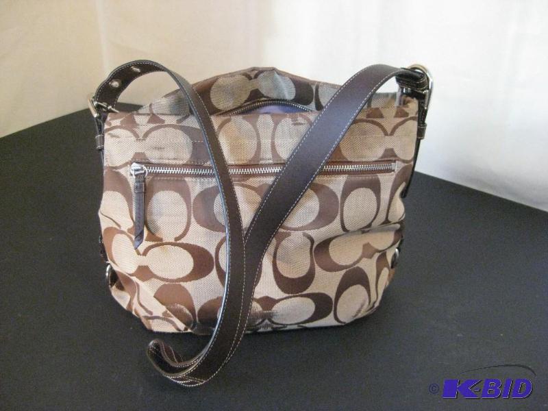 lot 35 image: Brown Canvas Coach Purse with Brown Leather S...
