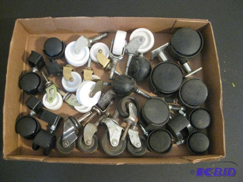 lot 48 image: Box of Casters Assorted Sizes and Colors...