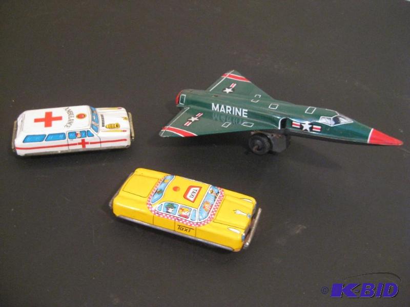 lot 56 image: Vintage Tin Friction Toys...
