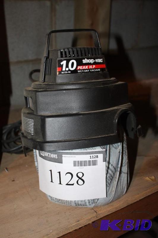 lot 1128 image: Shop-Vac 1.0 Peak HP WetDry Vacuum wCord Model 500X 120V 60HZ 5.7A.