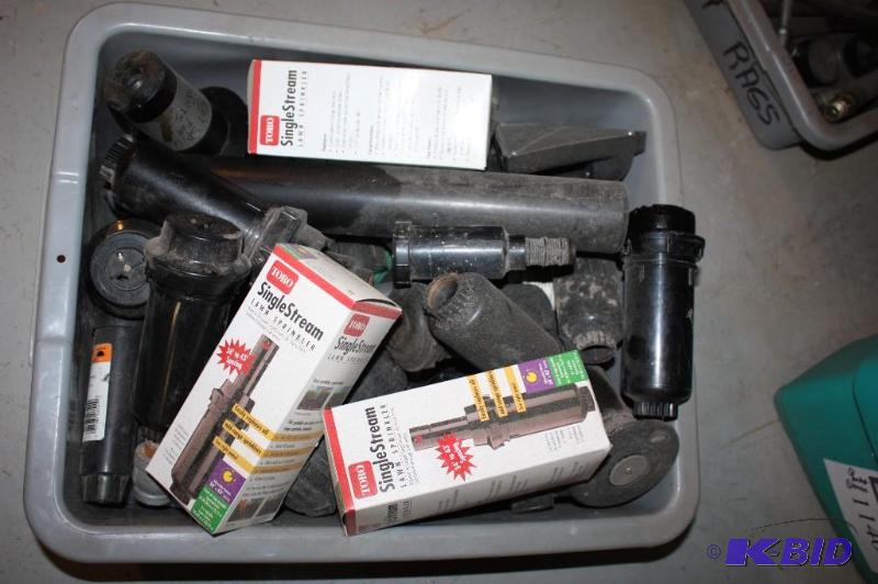 lot 1141 image: Container Lot of (2) Including Toro Single Stream Lawn Sprinkler Hose wMetal Adapters And More.