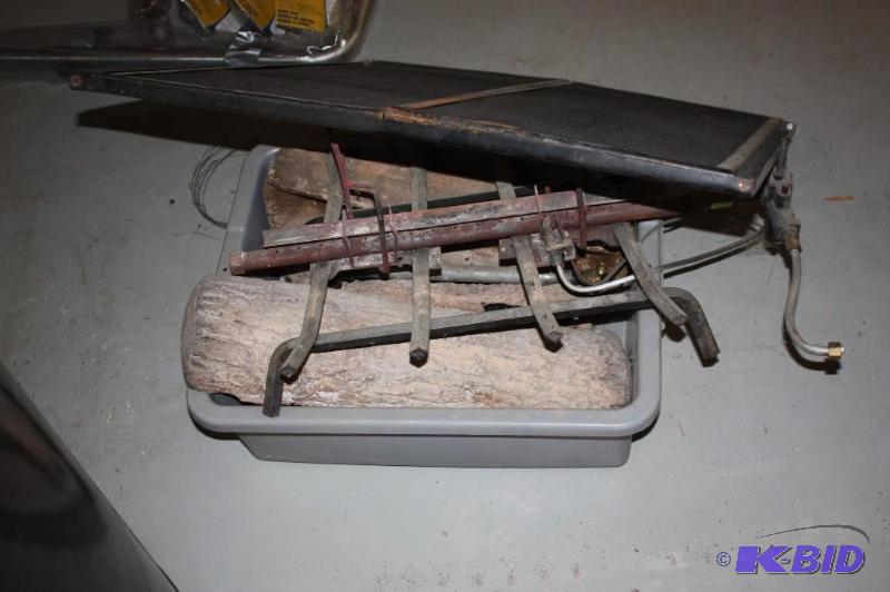 lot 1162 image: Fireplace Set Including Metal Grate Fire Screen Fake Logs And More.