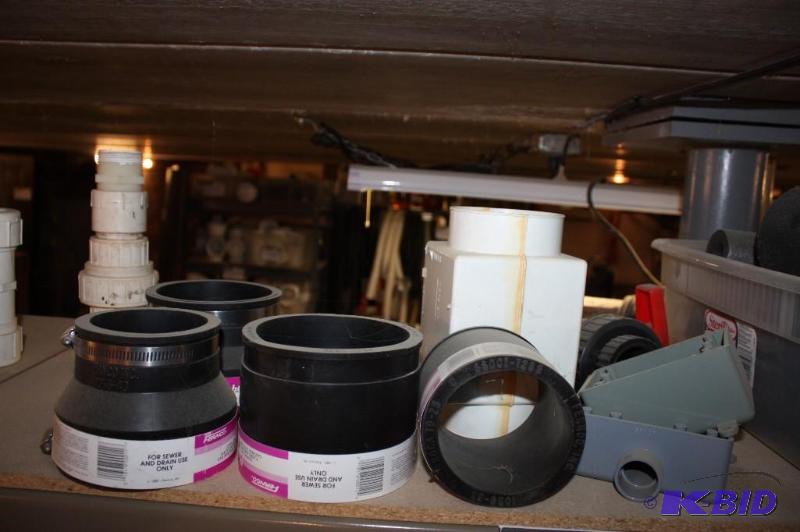 lot 1197 image: Shelf Lot Including Fernco For Tube, For Sewer & Drain Use Only Foam Guards And More.