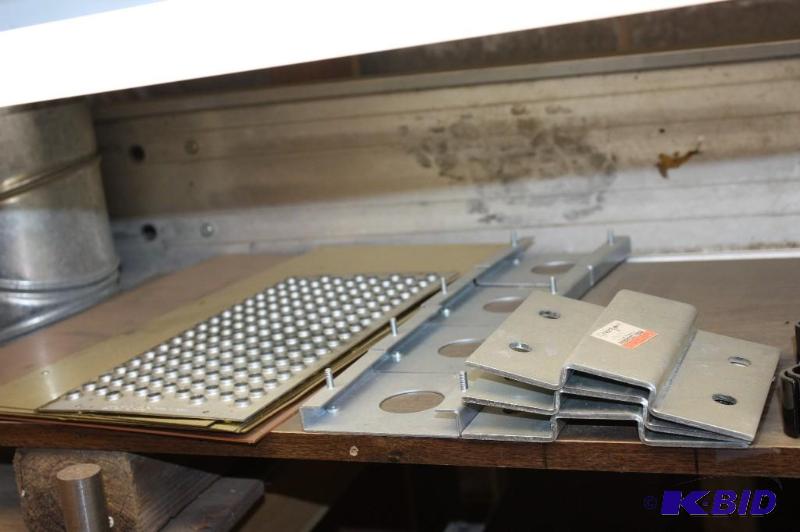 lot 1221 image: Shelf Lot Including Miscellaneous Metal Hardware Angle Bars Metal Pipes And More.