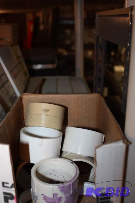 lot 1245 image: Shelf Lot of Various PVC Pipe Caps and More.