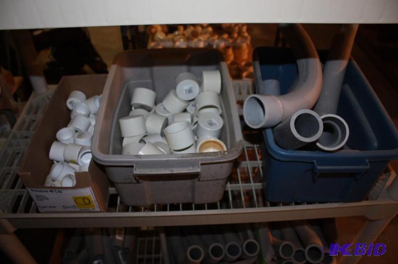 lot 1246 image: Shelf Lot of Various Sizes and Shapes of PVC Pipes and Caps.