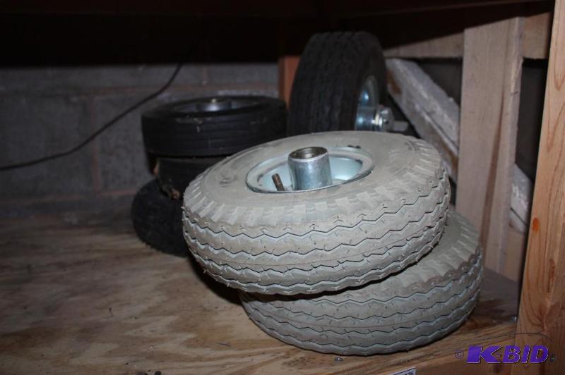 lot 1276 image: Shelf Lot of (6) Various Sizes and Shapes of Wheels.
