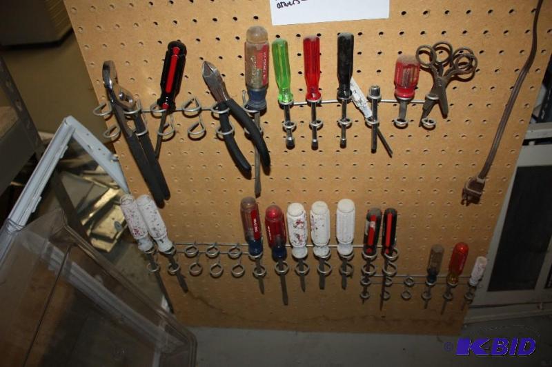 lot 1277 image: Wall Lot of (20) Includes Various Sizes of Screwdrivers Socket Screwdrivers Pliers and More.
