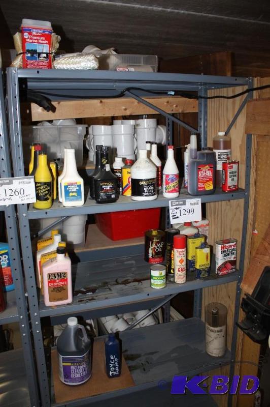 lot 1299 image: Shelf Lot Including Charcoal Lighter Lamp Oil Premium Marine Resin and More.