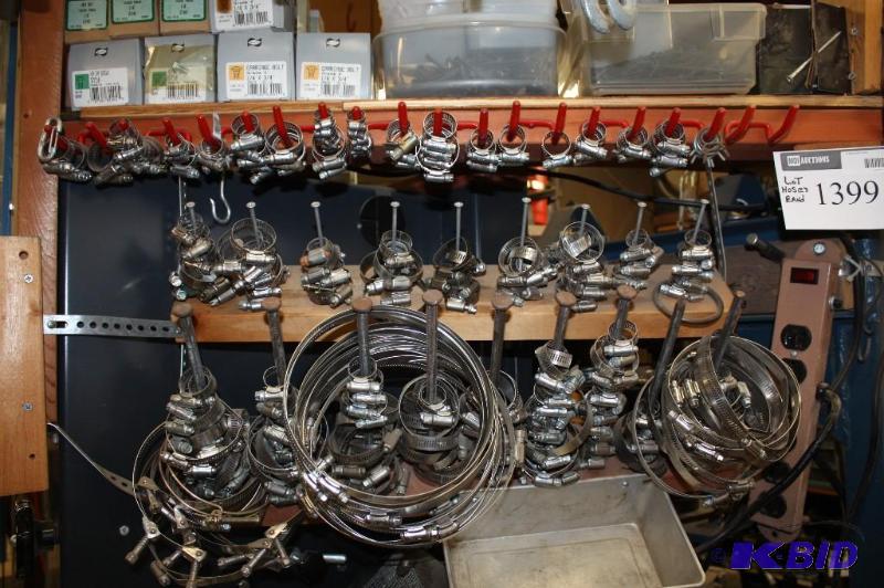 lot 1399 image: Wall Lot of Miscellaneous Hose Clamps wScrew Fasteners.