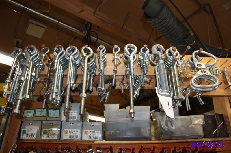lot 1439 image: Shelf Lot Including MIscellaneous Eyelit Bolts Hook Screws And More Does Not Include Contents Of