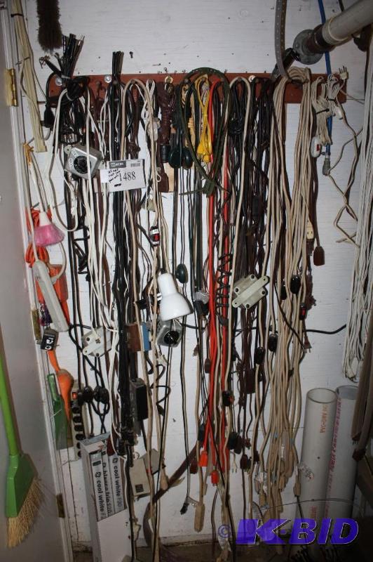 lot 1488 image: Rack Lot of Various Lengths and Types of Power Cords.