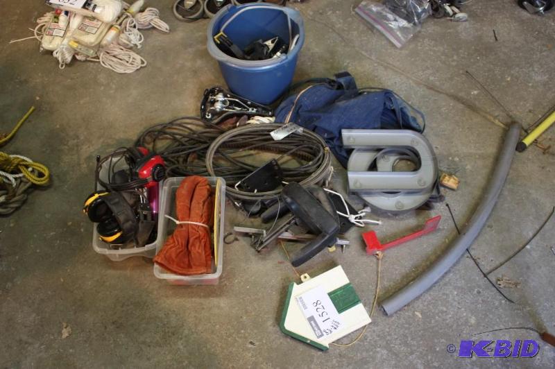 lot 1528 image: Floor Lot Including Wheels Cords Clamps And More.