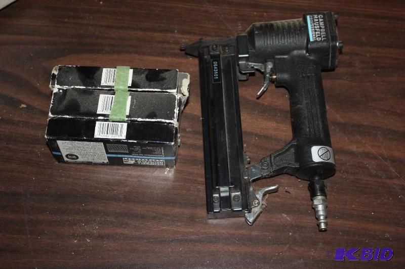 lot 1551 image: Campbell Hausfeld Professional Pneumatic Staple Gun Includes Extra Staples.