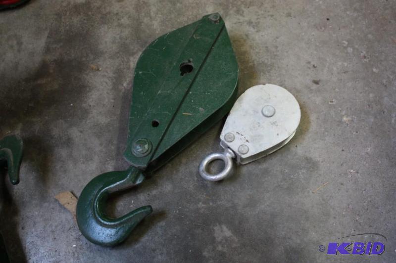 lot 1561 image: Lot of (2) Including (1) Pulley and (1) Pulley Housing With Hook.