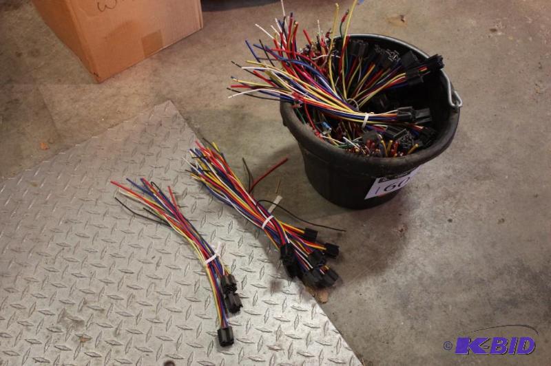lot 1604 image: Container Lot of Miscellaneous Electrical Plug-Ins.