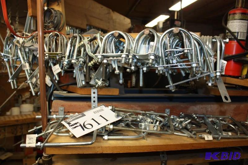lot 1611 image: Shelf Lot Including U-Bolts Screw-Down Clamps Does Not Include Shelf.