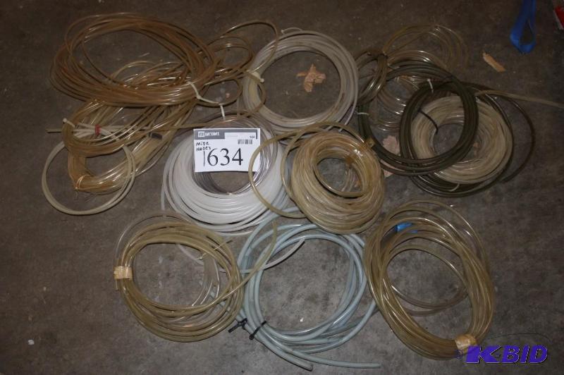lot 1634 image: Lot of Various Sizes and Lengths of Plastic Hoses.
