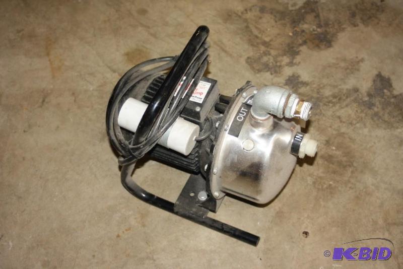 lot 1660 image: Simer Brand Portable Utility Pump, Model 2825ss, 1HP, 115 Volt.