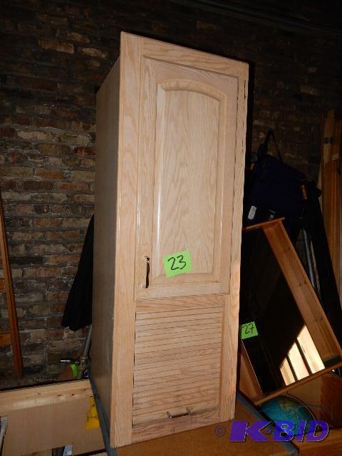 lot 23 image: Garage door Cabinet