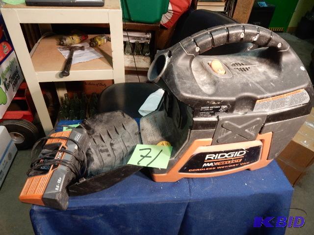 lot 71 image: Ridgid Wet Dry Vac, Cordless. Charger included. NO BATTERY