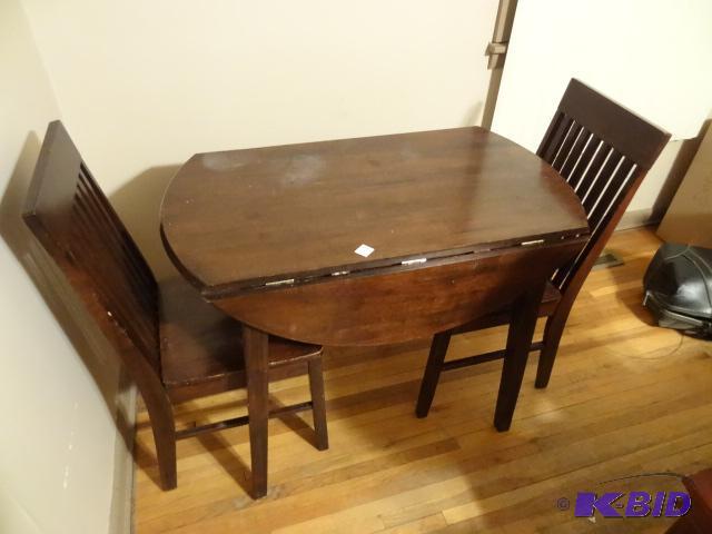 Wood kitchen table with 2 chairs. Drop down s...
