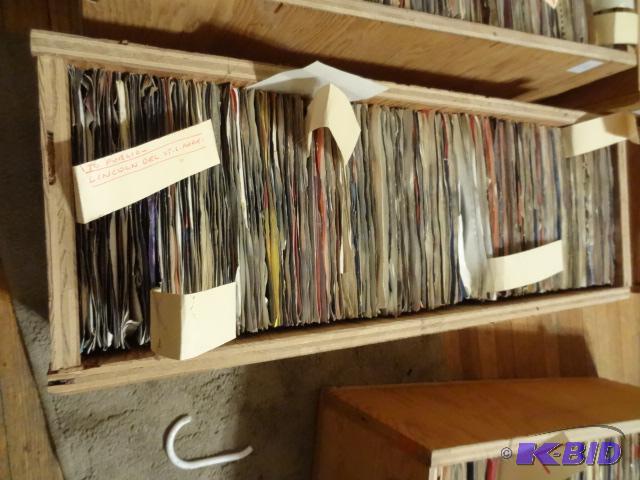Box full of records. 45s. At least 100 recor...