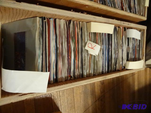 Box full of records. 45s. At least 100 recor...