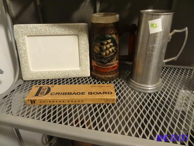Picture frame. Cribbage board. 2 beer steins...