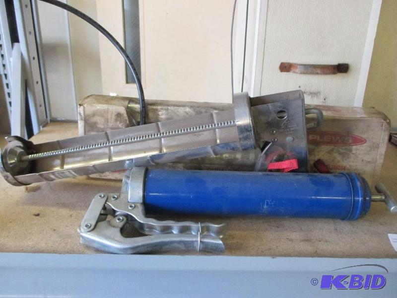 2 grease guns caulk gun...