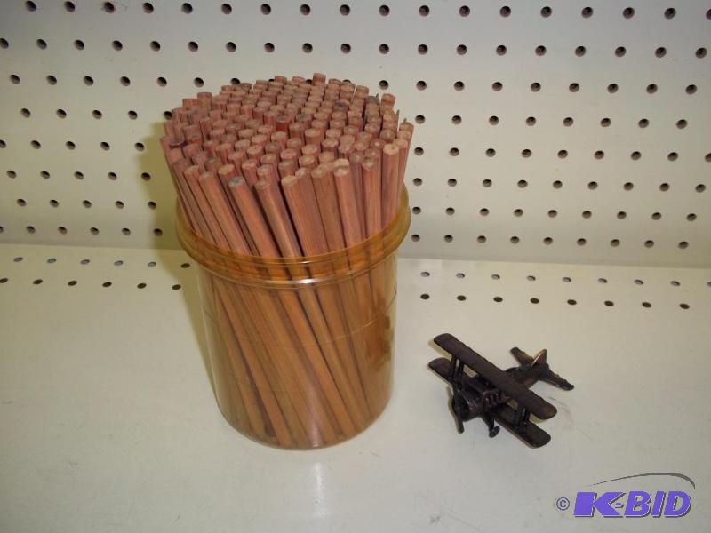 Container of Pencil and toy airplane pencil s...