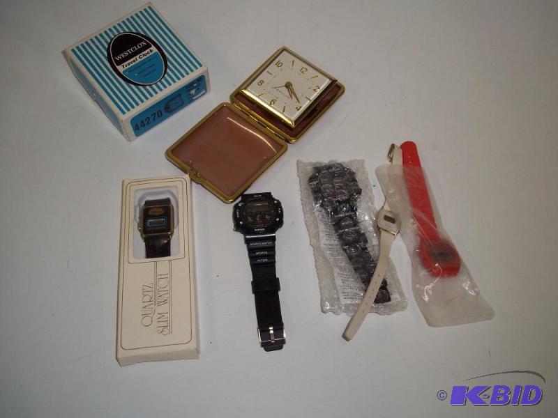 5 Watches and a travel clock...