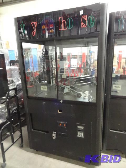 lot 3 image: Rainbow skill crane. Dollar bill acceptor may...