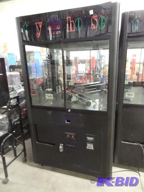 lot 5 image: Rainbow skill crane. Dollar bill acceptor may...