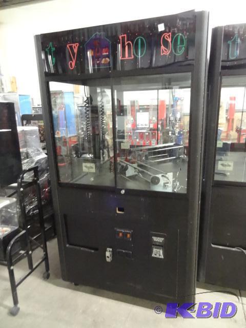 lot 6 image: Rainbow skill crane. Dollar bill acceptor may...
