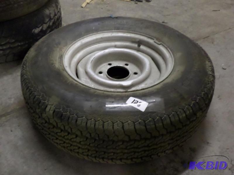 lot 128 image: (1) P2357516 Tire With 6-Lug Steel Wheel...