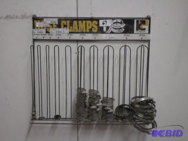 lot 67 image: Wall-Mount Hose Clamp Rack With Misc Hose Cla...