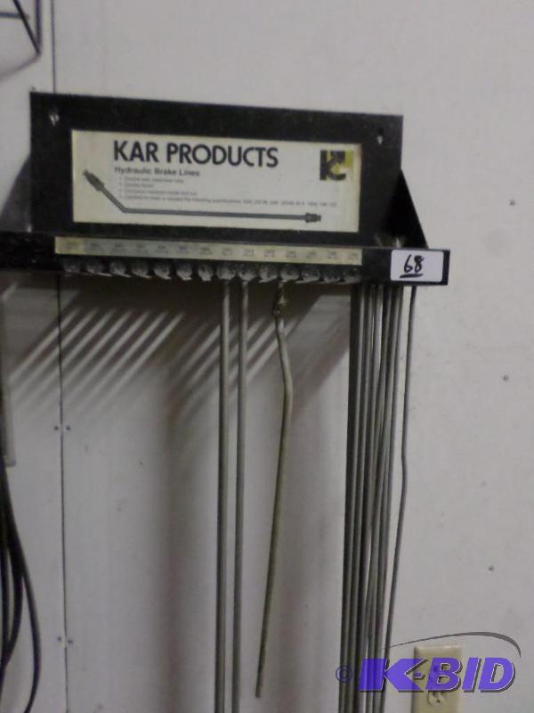 lot 68 image: Wall-Mount Brake Line Rack With Numerous Brak...
