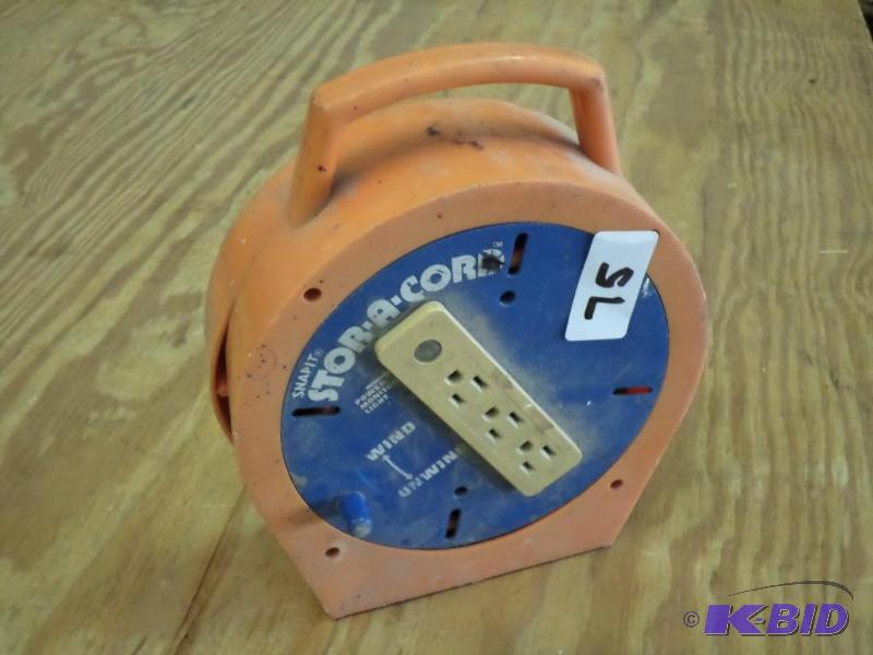lot 75 image: Snap-It Stor-A-Cord Electric Cord Reel With C...