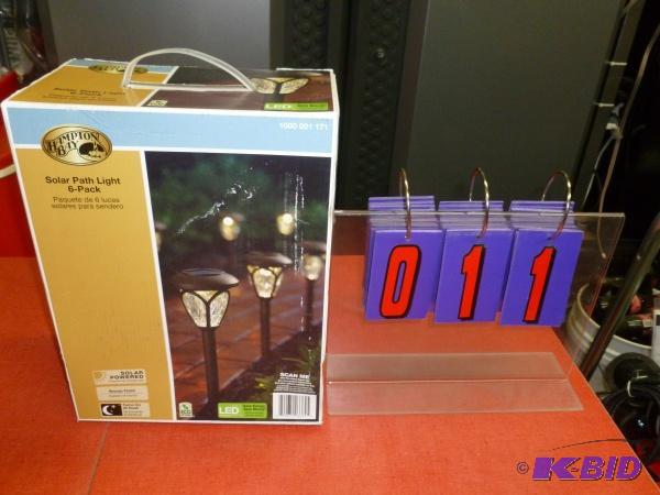 lot 11 image: Hampton bay 6 pack solar light kit. As shown....