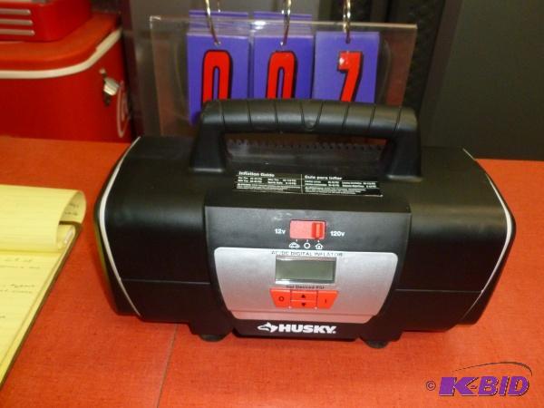 lot 7 image: Husky 12110 volt inflator. As shown. Tested ...